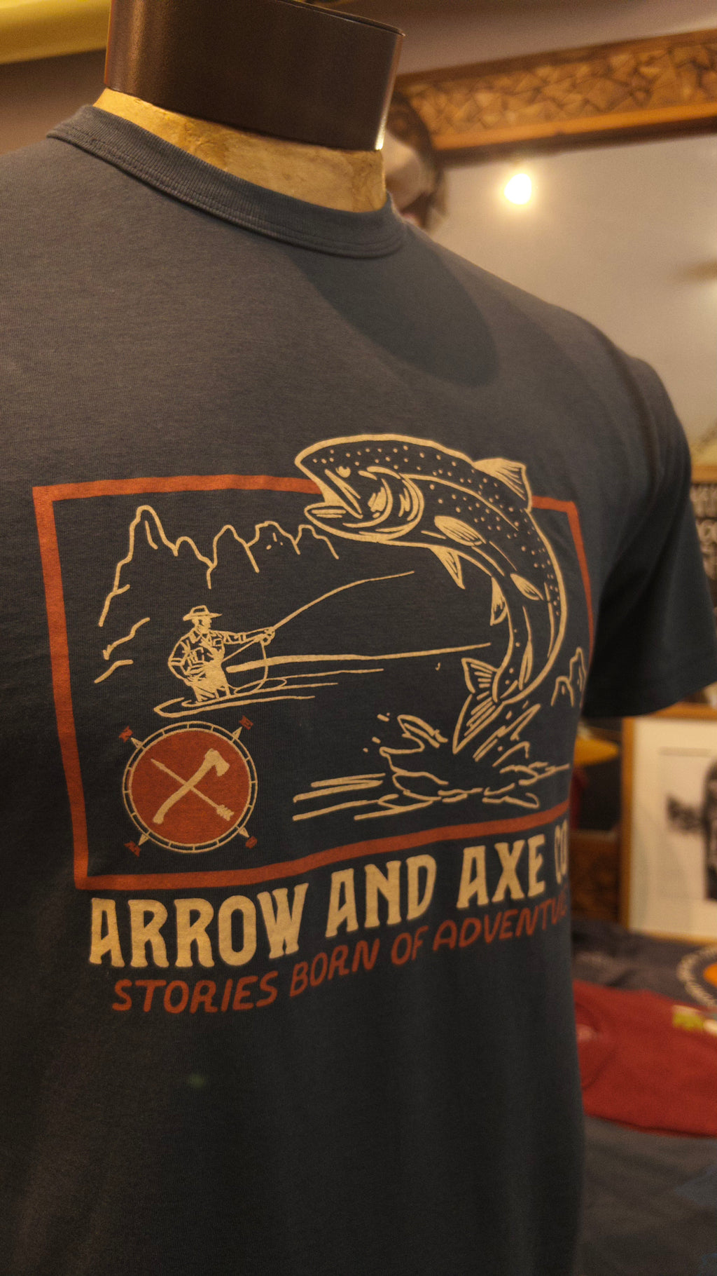 Stories Born of Adventure | Arrow and Axe Unisex Short Sleeve Tee Shirt