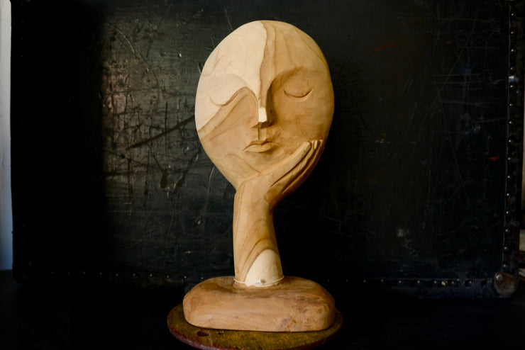 Hand Carved Resting Face
